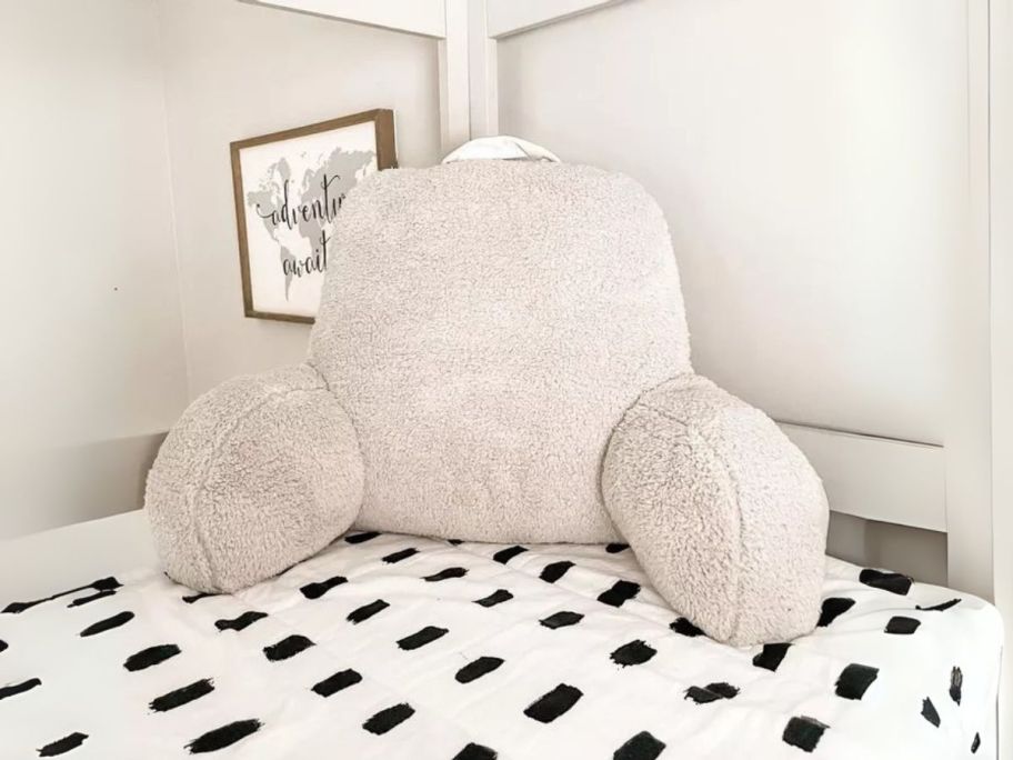 off white Room Essentials Faux Shearling Bed Rest Pillow on bed