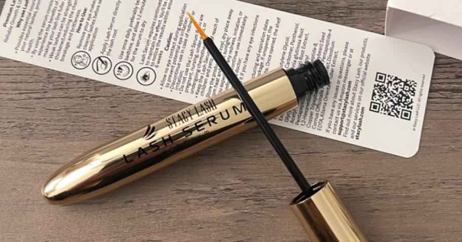 tube of lash serum on a table with packaging