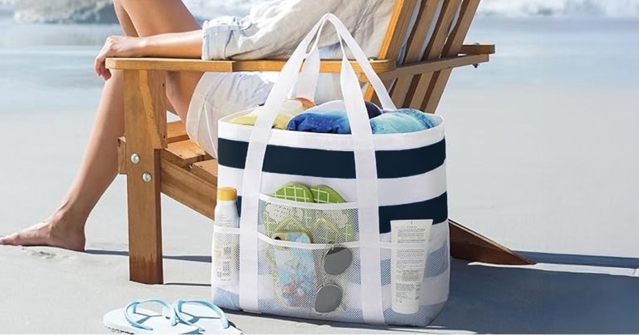 Amazon Beach Bag sitting by a beach chair on the beach