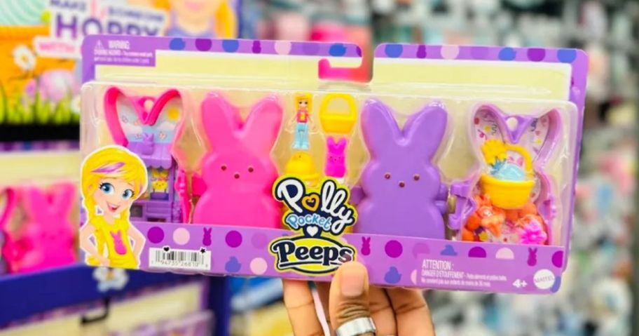 hand holding Easter polly pocket play set