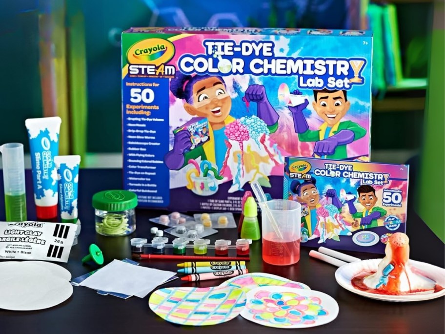 a Crayola Tie-Dye Color Chemistry Set with the included items and experiments on a table
