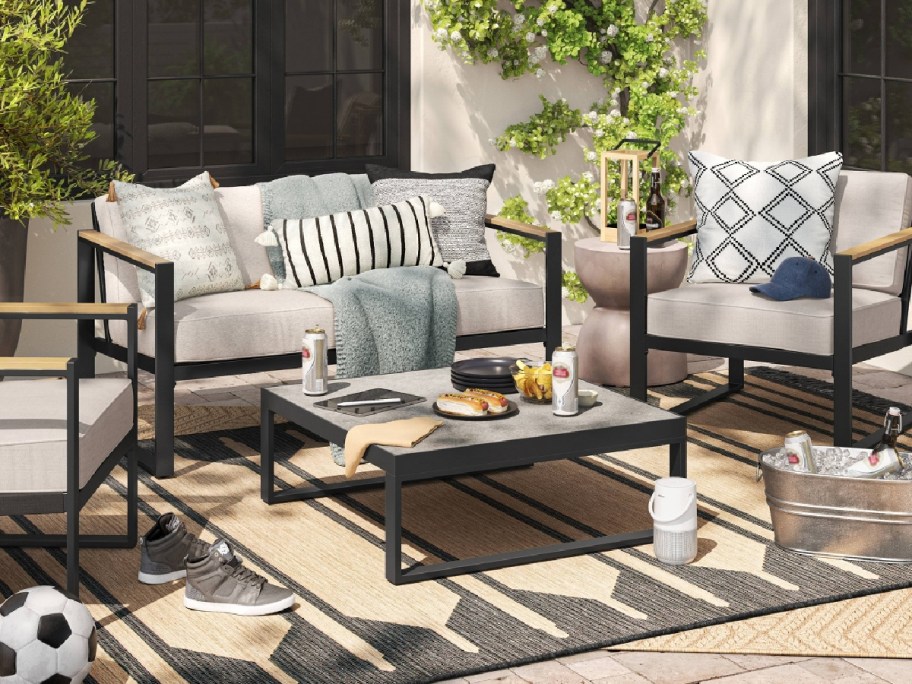 seat outdoors on a rug