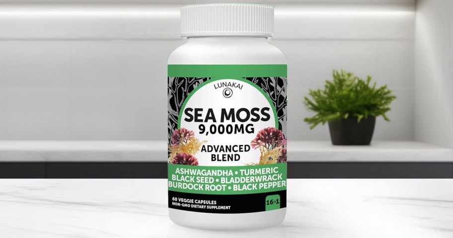 bottle of sea moss on a white kitchen counter