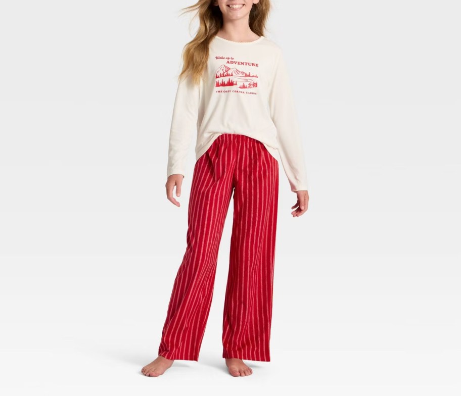 girl modeling holiday pajamas