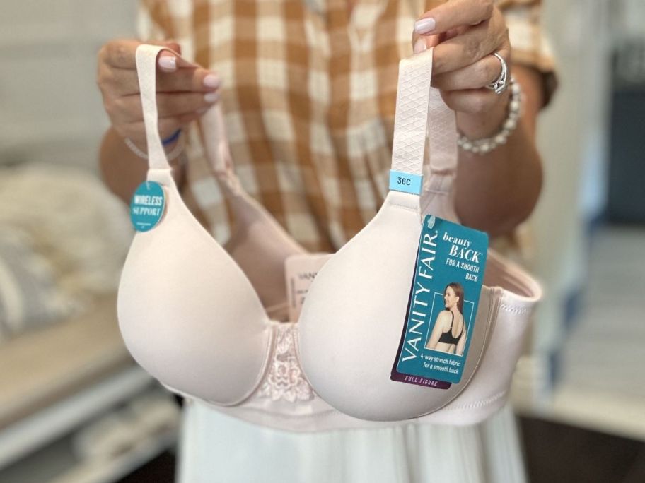 woman holding a Vanity Fair Beauty Back Full Figure Wireless Smoothing Bra