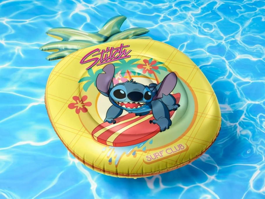 A Pi neapple shaped stitch float in a pool