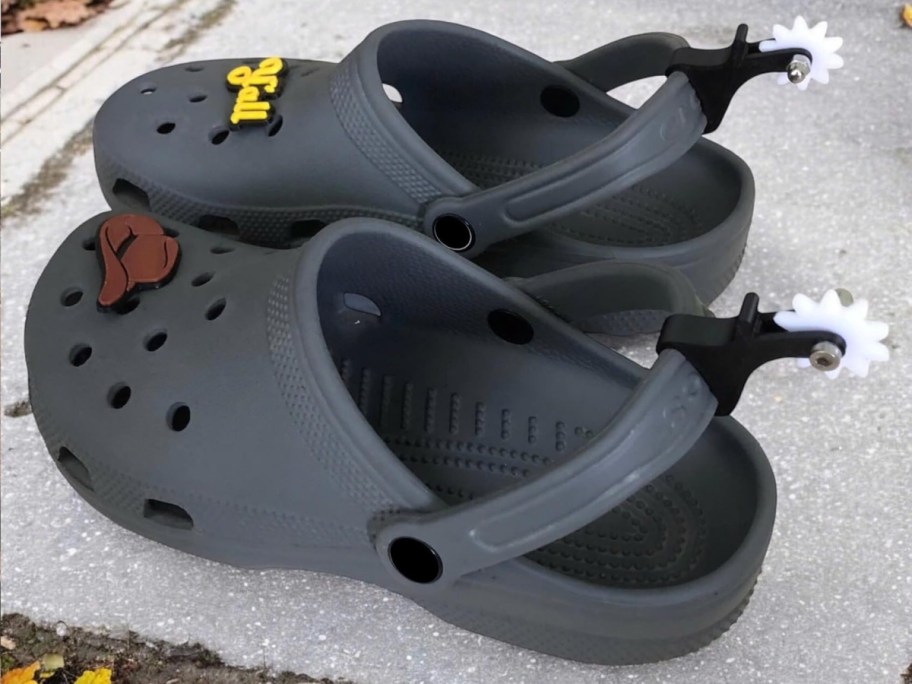 spurs on the back of black clogs