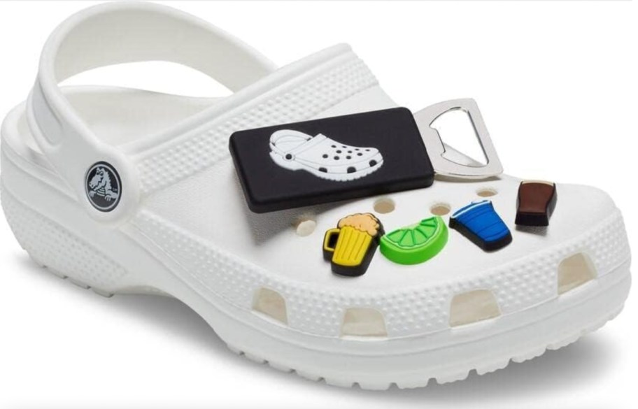bottle opener and drink accessory on white crocs