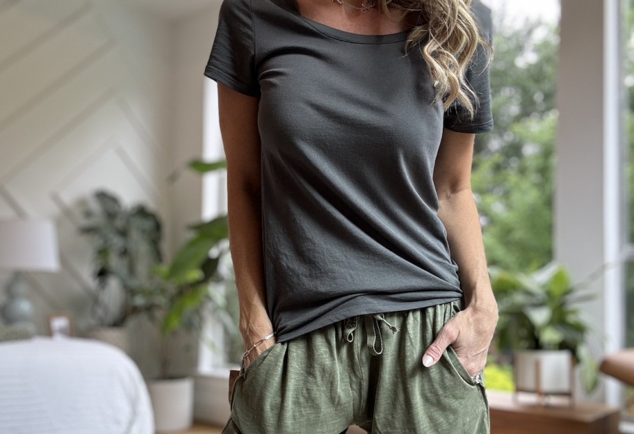 close up of woman wearing dark gray tshirt