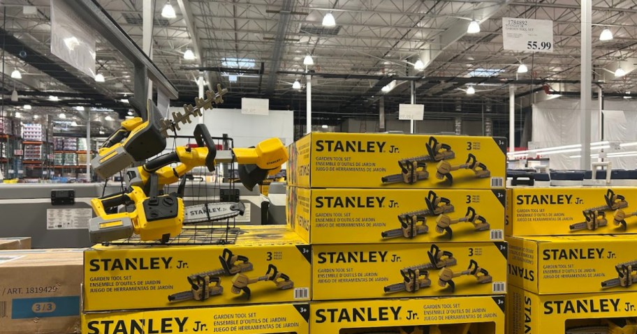 stanley jr garden tool sets in and out of packaging on display in a store