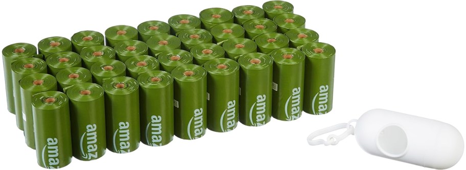 green rolls of dog waste bags with white dispenser
