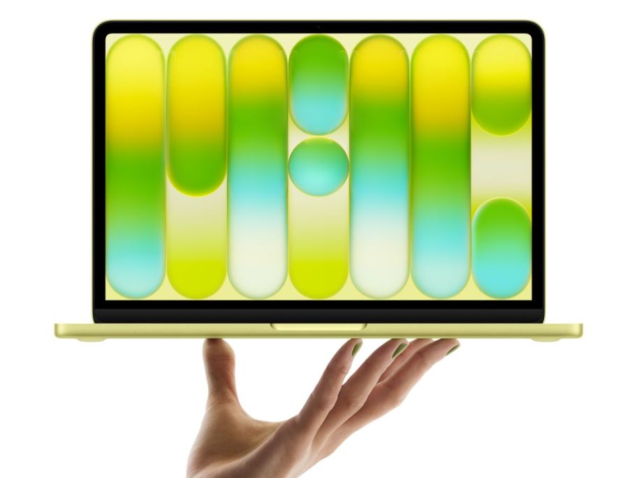 hand holding Apple 2026 MacBook Neo 13" Laptop