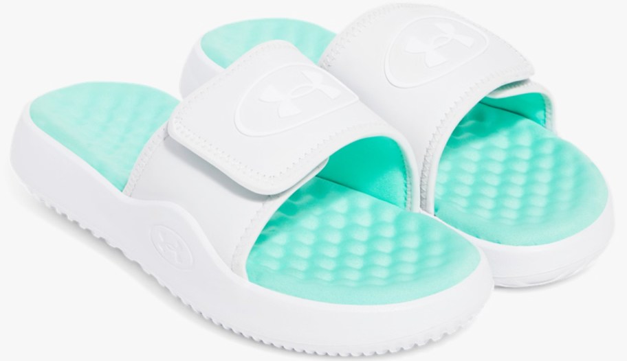 pair of light grey and mint green slides