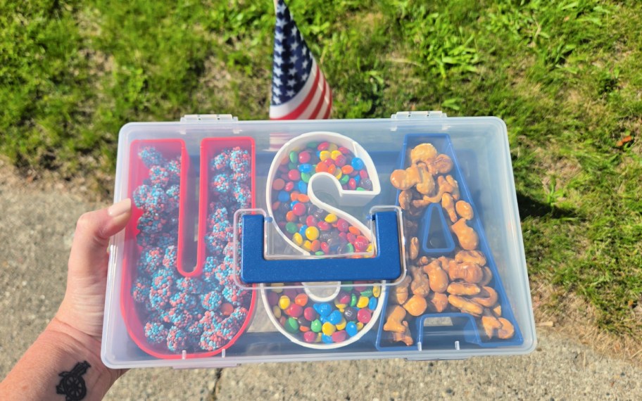 usa snackle box full of snacks in hand