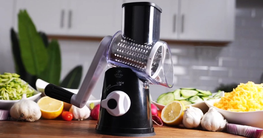 black cheese grater sitting on a counter