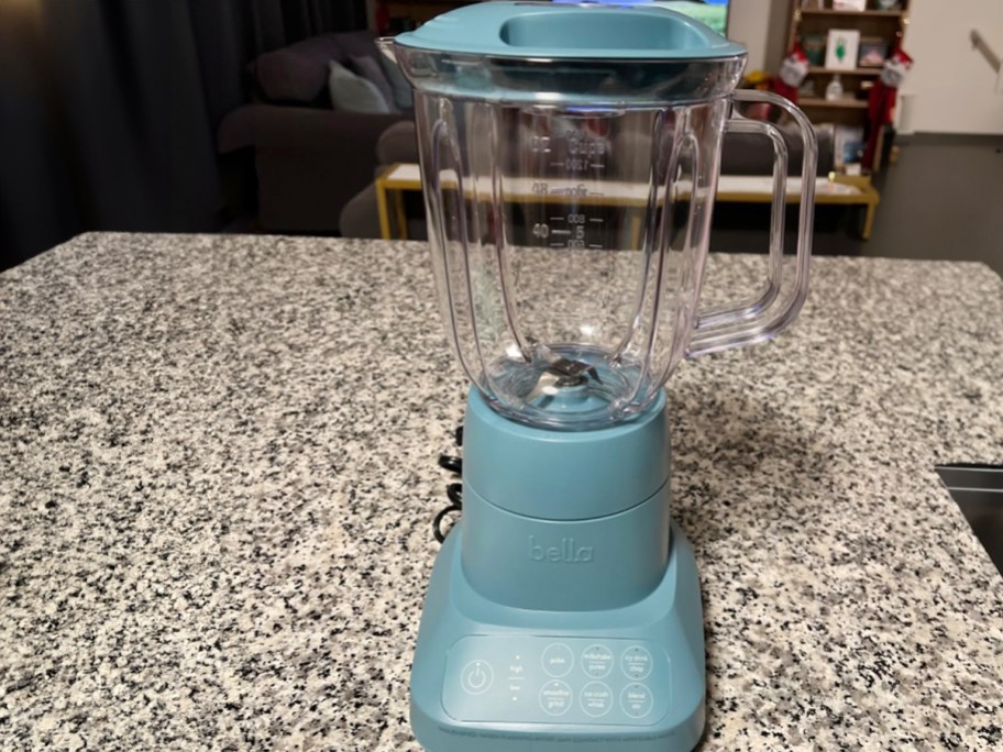 teal blender on countertop