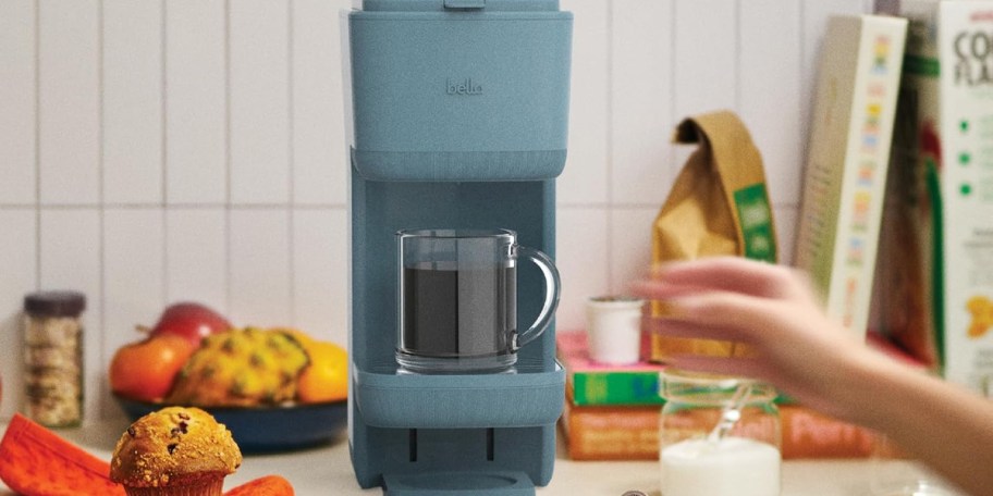 blue coffee maker on countertop 