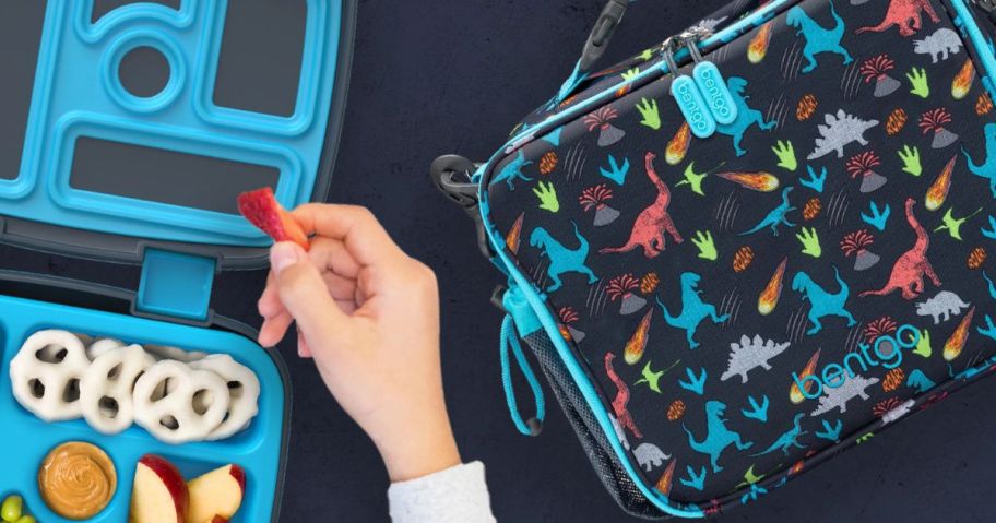 kid eating from Bentgo Kids' Lunch Bag