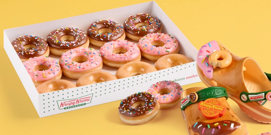 Krispy Kreme x Crocs Specialty Dozen on a golden background along with the new crocs