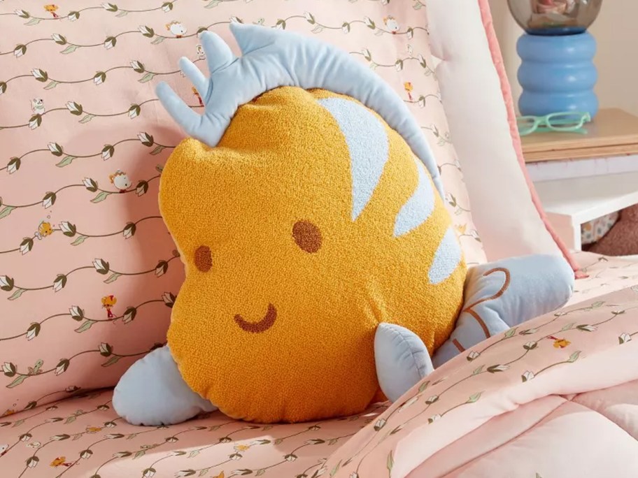 flounder pillow on bed