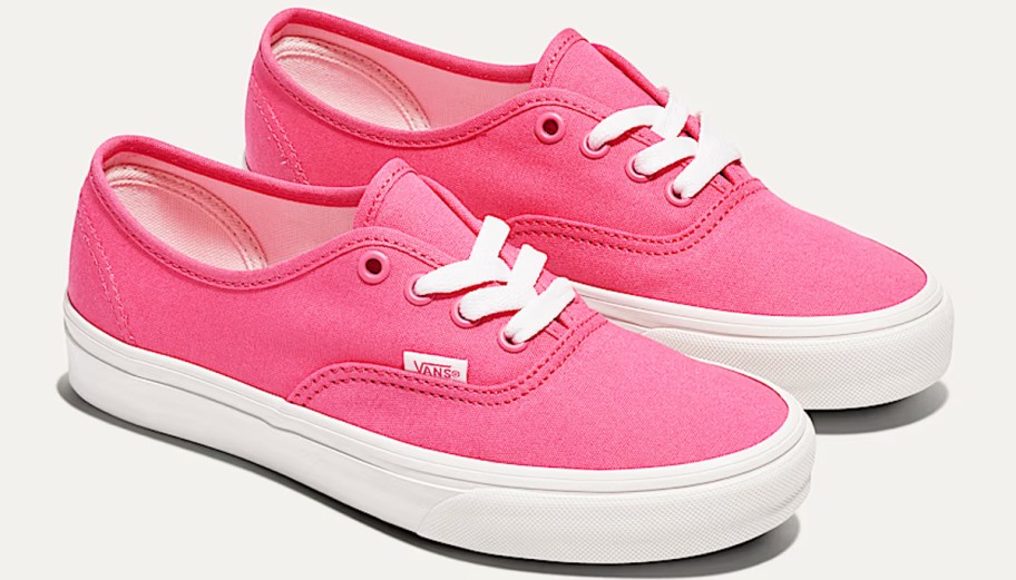 pair of hot pink vans sneakers