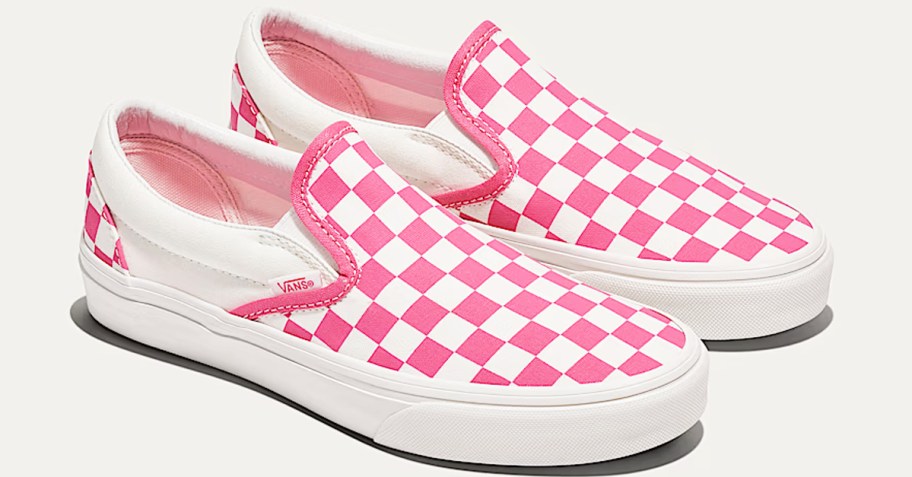 pair of pink and white checkerboard slip on sneakers