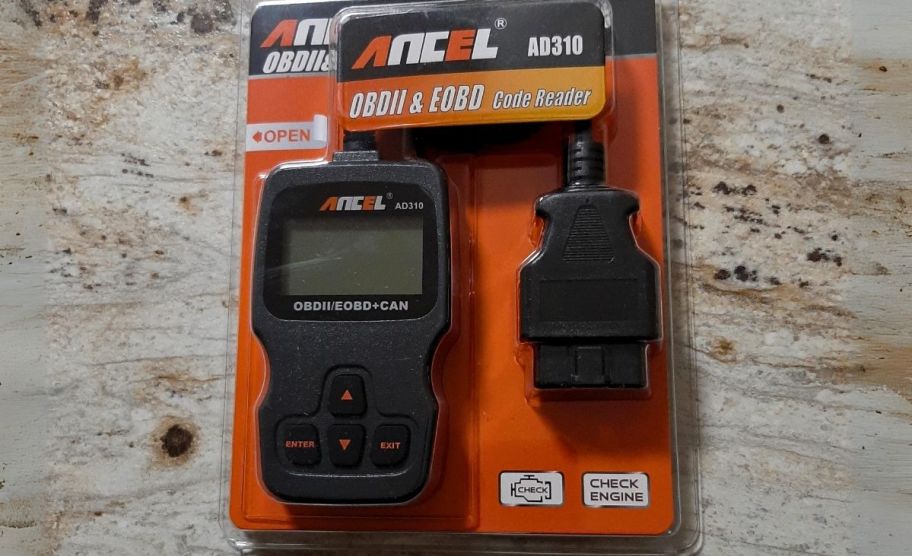 and OBD code reader and cord in a packaging