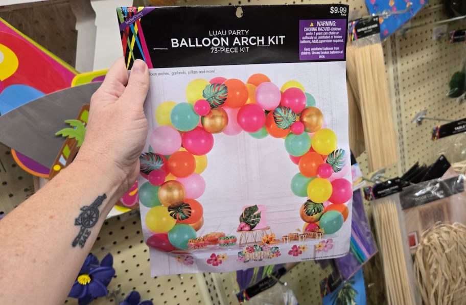 hand holding hawaiian balloon arch kit