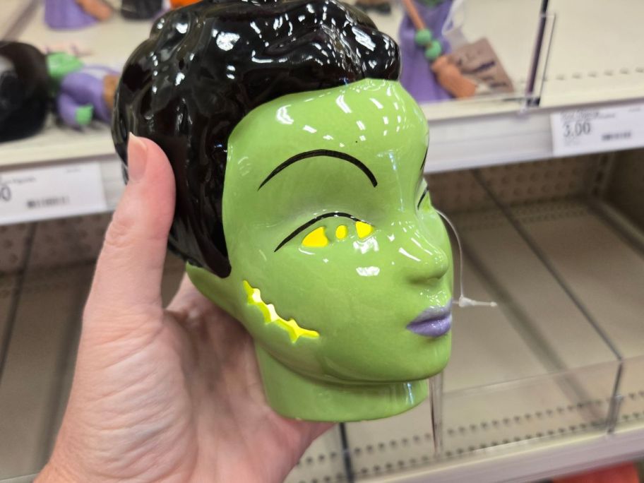 green bride of frankenstein led figural in hand in store