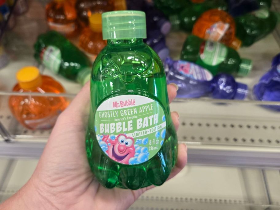 green Mr. Bubble Bubble Bath in hand in store