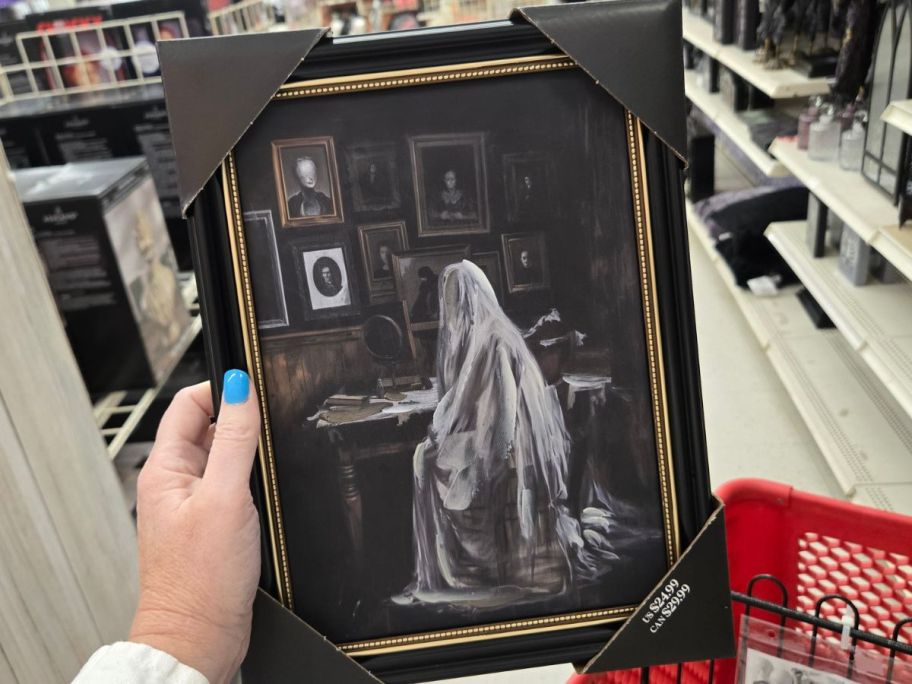 Ghostly Veiled Figure Wall Art in hand in store