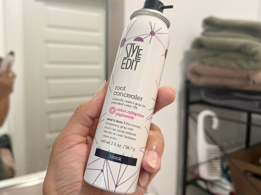 hand holding style edit root touch up spray 