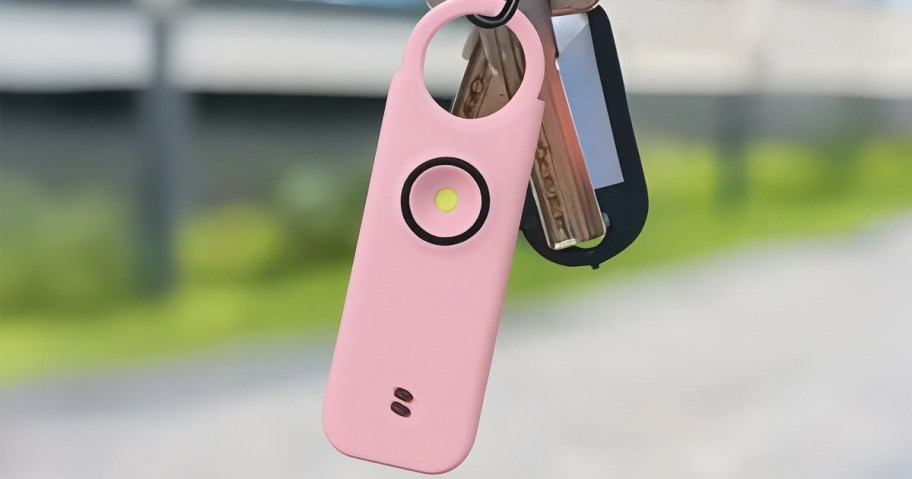 pink personal alarm on a keychain 