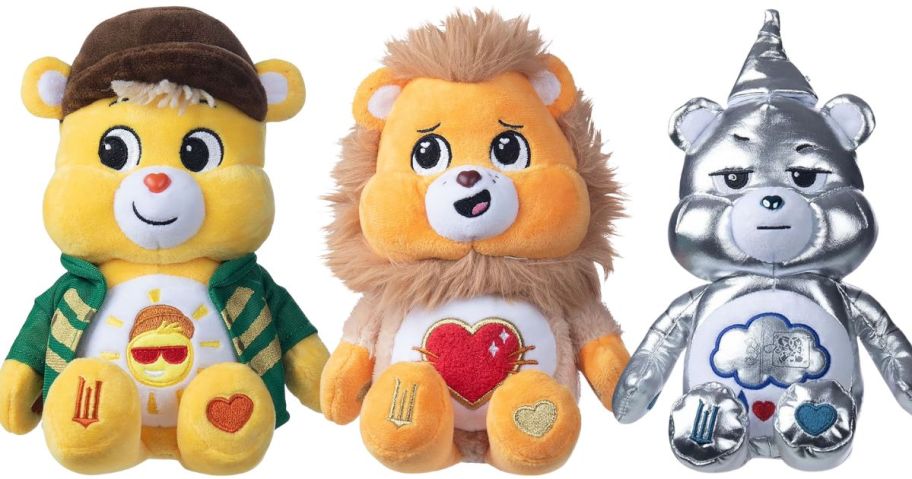 a scarecrow, lion, and tin man care bear