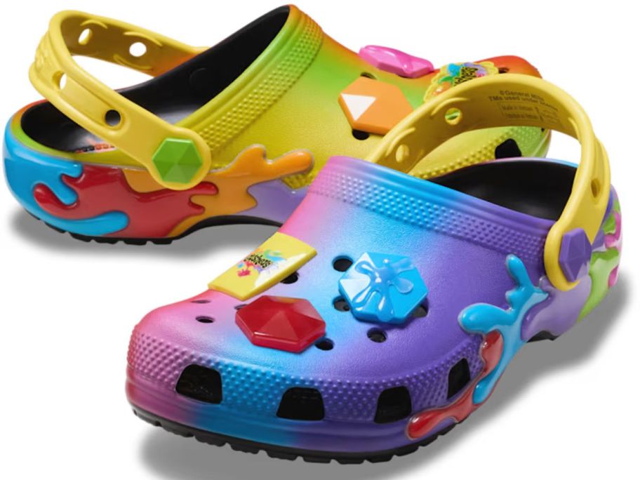 A multi-colored pair of crocs with Gusher's jibbitz