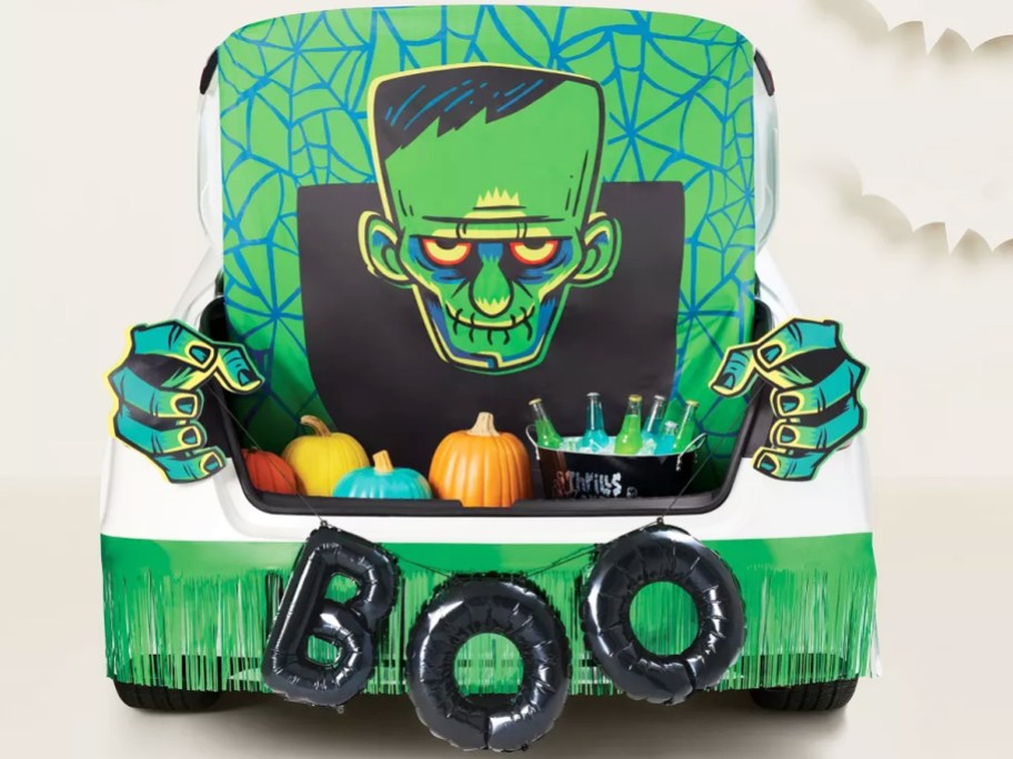 green and black frankenstein decor kit on a car