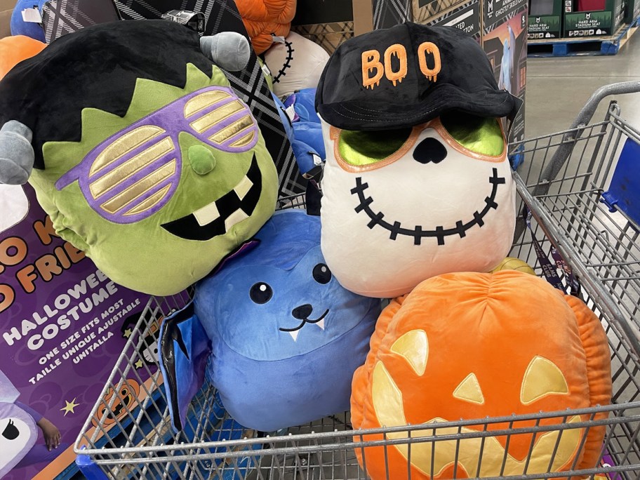 4 halloween plush in a shopping cart