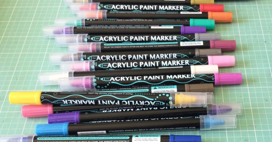 colorful dual-tip markers on a table