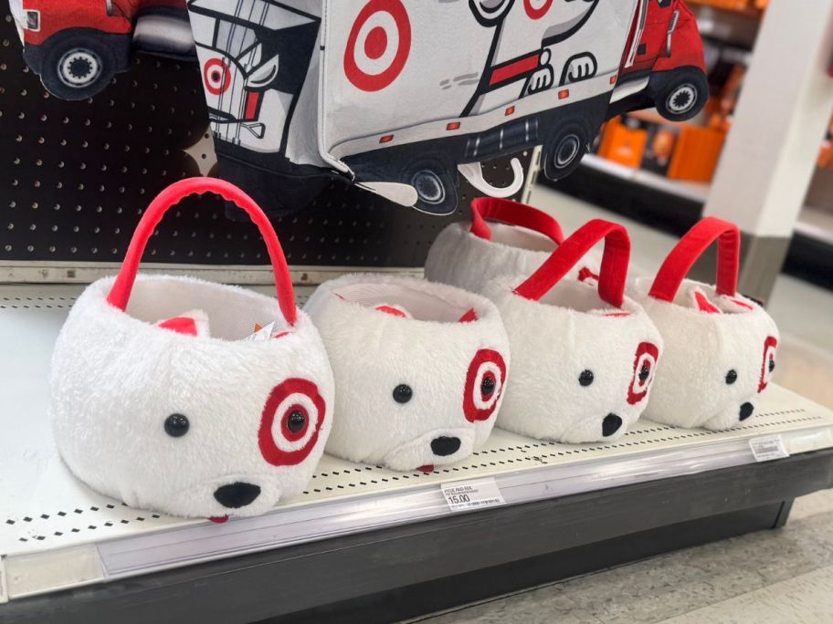 4 Hyde & EEk! Boutique&nbsp;Bullseye Dog Halloween Trick or Treat Baskets lined up on an endcap