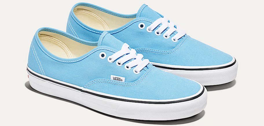 pair of blue and white sneakers