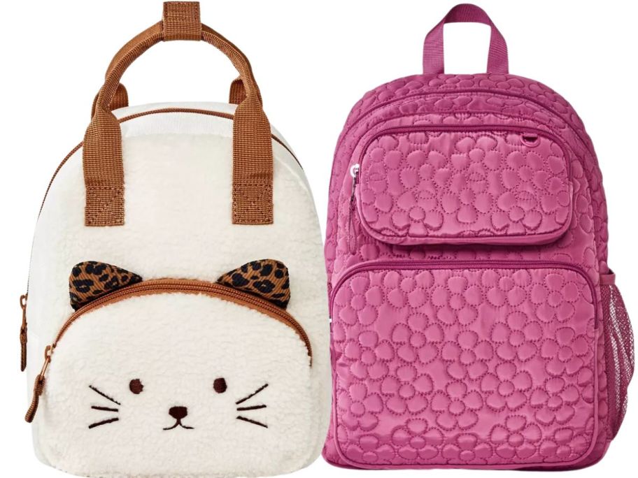 a cat designed backpack and a pink backpack