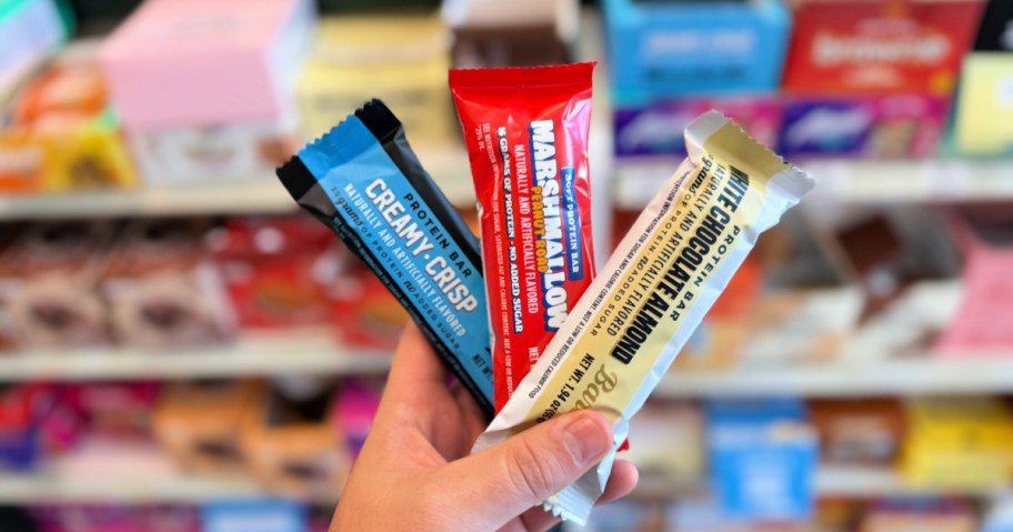 barebells protein bars in hand