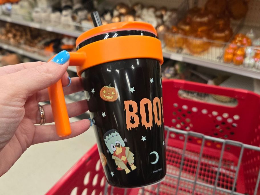 bluey halloween tumbler in hand in store
