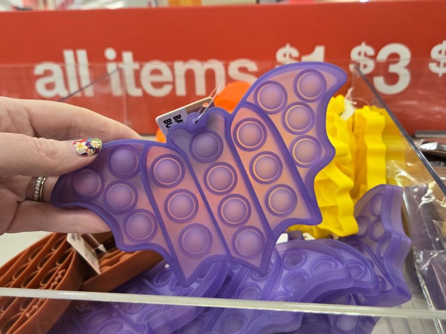 Shaped Poppers Bat in hand in store