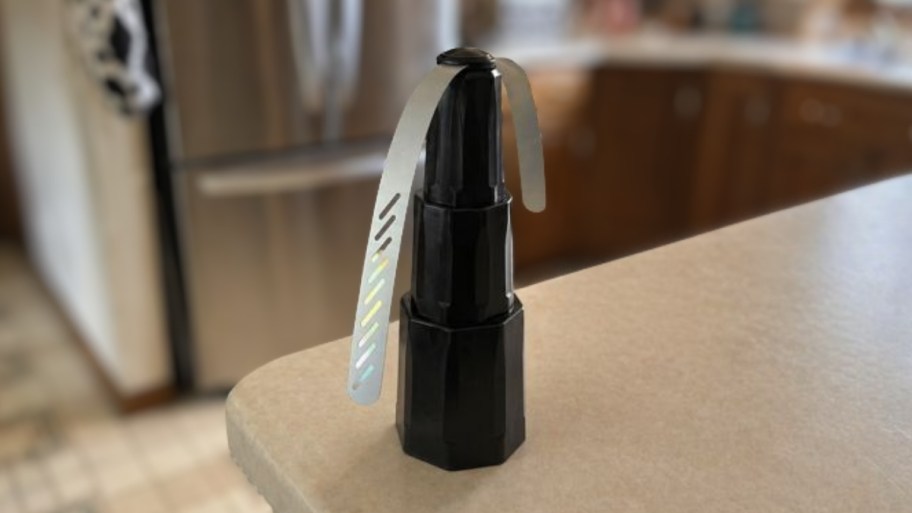 a fly fan on a counter top