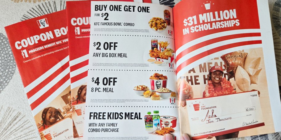 kfc coupon books on table with one open 