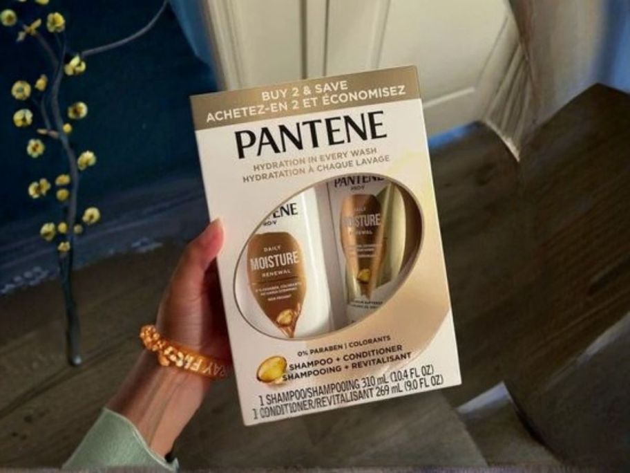 pantene pro-v shampoo and conditioner set in hand