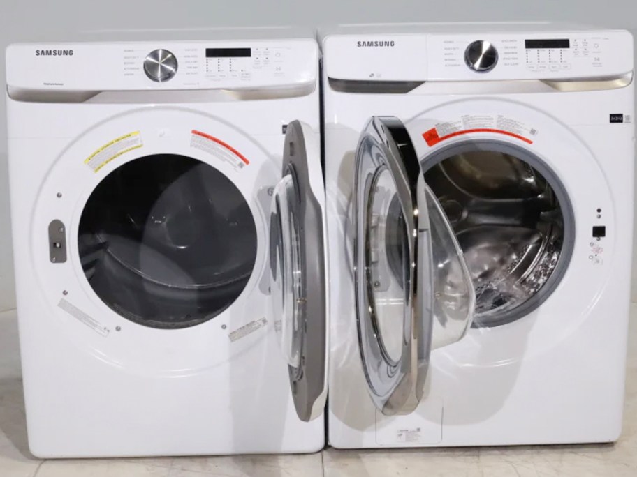 white washer and dryer with doors open 