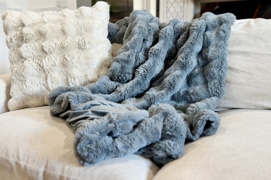 grey bubble fur throw blanket on couch