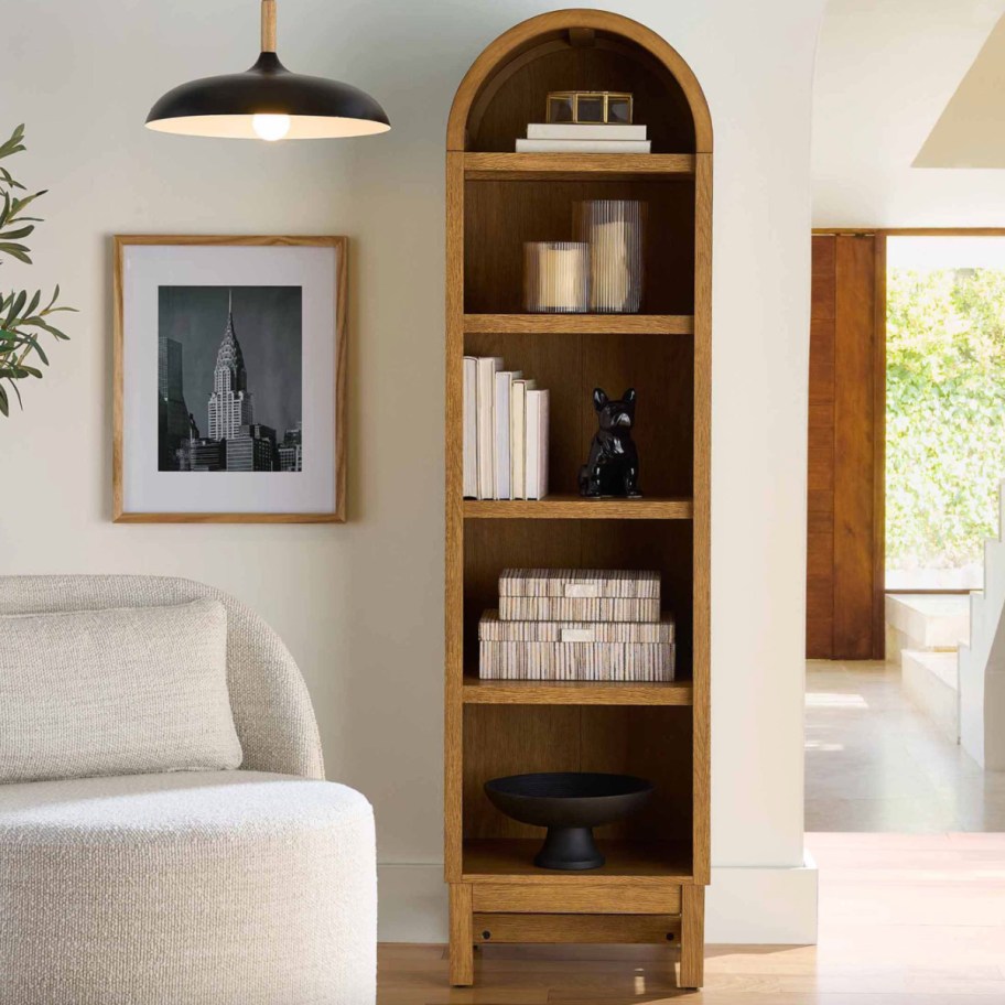 narrow wood arch bookshelf